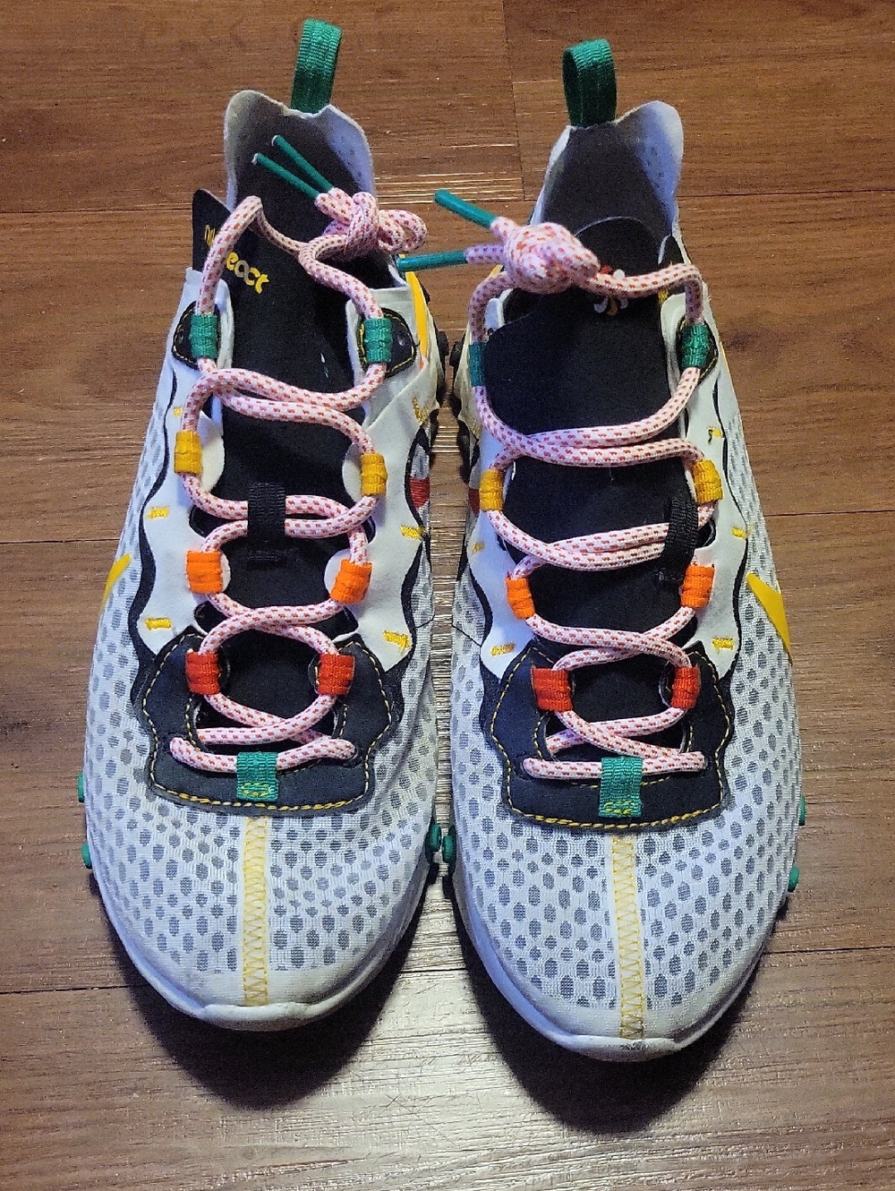 Nike Men's White Athletic Shoes with Pink, Orange, Yellow & Green Accents